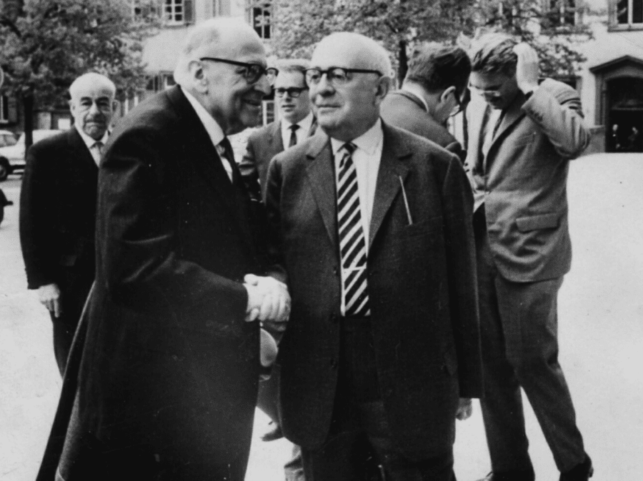 The Frankfurt School — (left to right) Max Horkheimer, Theodor Adorno, and Jürgen Habermas at a 1964 sociology conference in Heidelberg. The Institute for Social Research, founded in 1923 and relocated to Columbia University in New York after 1933, produced the intellectual architecture that would reshape Western European and American academic and cultural institutions for the following half-century. Their project — diagnosing and dismantling the conditions that produced fascism — was intellectually serious, historically understandable, and produced consequences they may not have fully intended. Those consequences, in the form of academic and institutional opposition to traditional European cultural identity and national sovereignty, are measurable and ongoing. Photo: Jeremy J. Shapiro / Wikimedia Commons