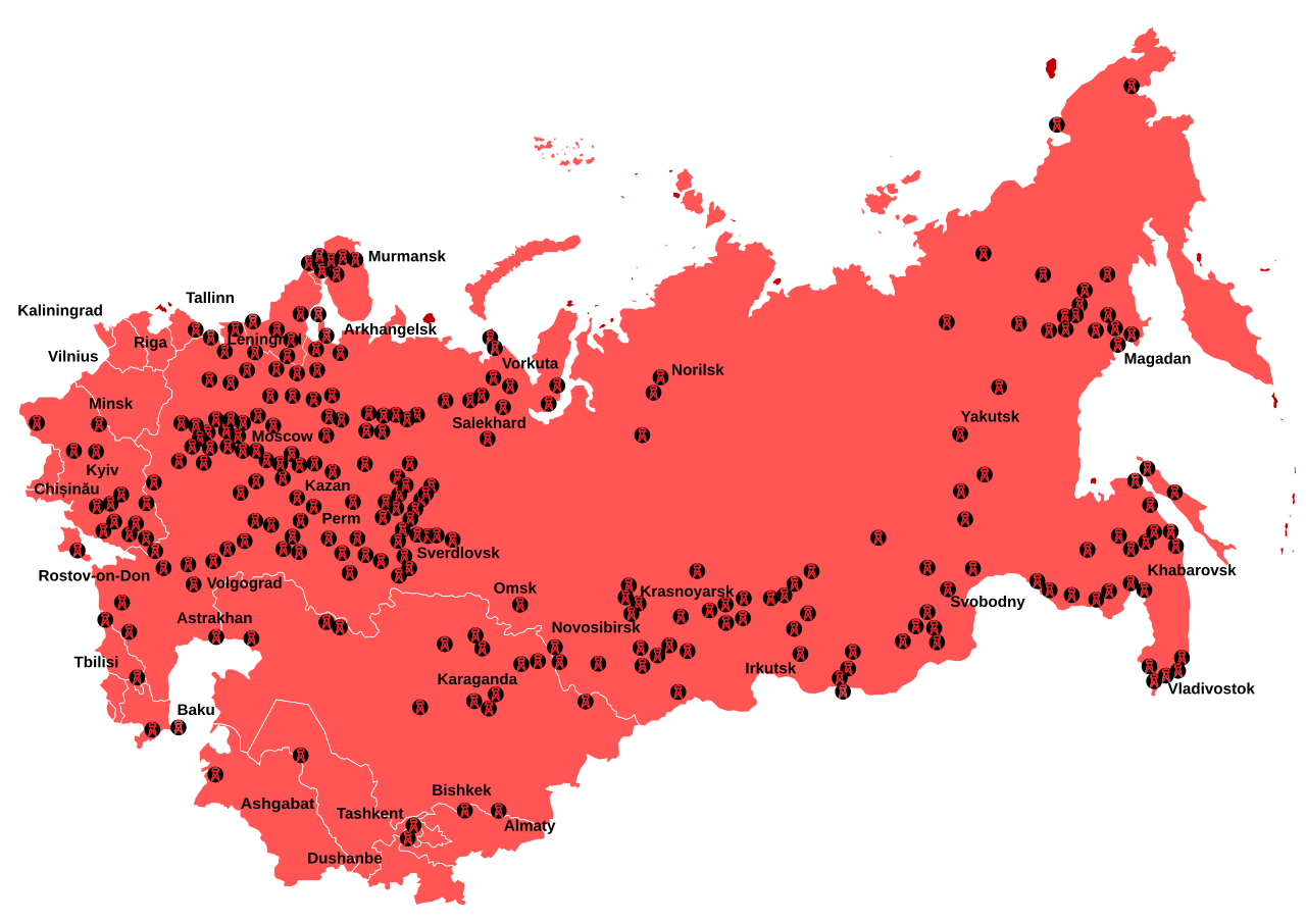 The Soviet Gulag system — geographic distribution of forced labor camp complexes across the USSR. At its peak, 476 documented camp complexes stretched from the Baltic to the Pacific, from the Arctic tundra to the Central Asian steppe. 18 million people passed through them. The camps were not a secret internal aberration — they were the foundation of the Soviet economic and industrial system, staffed by human beings whose labor was extracted under conditions designed to extract maximum output before death. This is what 20 years of Bolshevik economic theory looked like on a map. — Wikimedia Commons